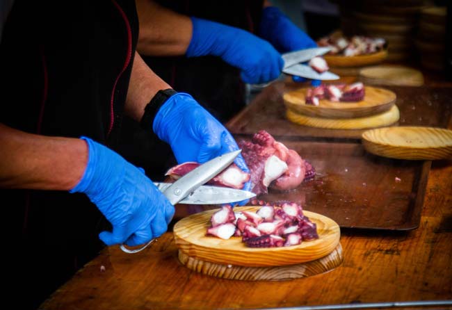 Preparing a portion of octopus